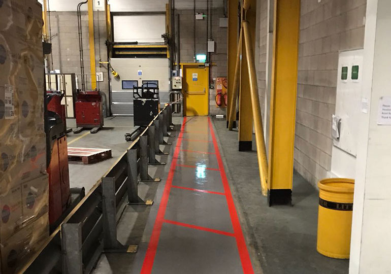 Floor Marking In Warehouse Walkway